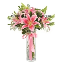 This bouquet is perfect for all occasions -  modern arrangement and nice combination of pink lilies and exotic greenery.