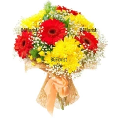 Vibrant  cheerful  bouquet of variuos flowers and greenery.  Nice and cheerful  combination of gerberas,  chrysanthemums, gypsophila, greenery and wrapping paper.