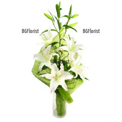 Lovely and elegant bouquet of white lily and greenery - classic arrangement , perfect for all occasions and recipients