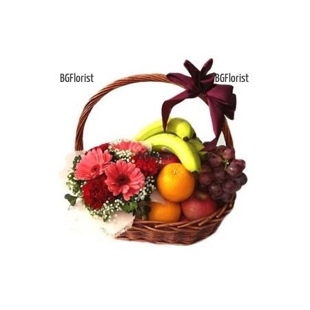 Send fruits and flowers in a basket