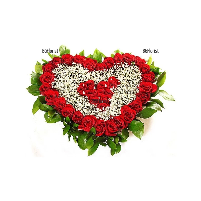 Send heart of roses and gypsophila by courier