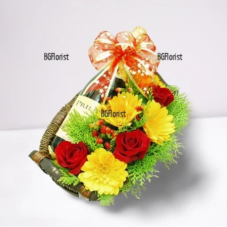 Подаръчен комплект от цветя и червено вино