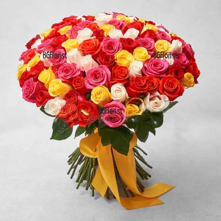 Send bouquet of 101 roses of different colours  by courier to the address