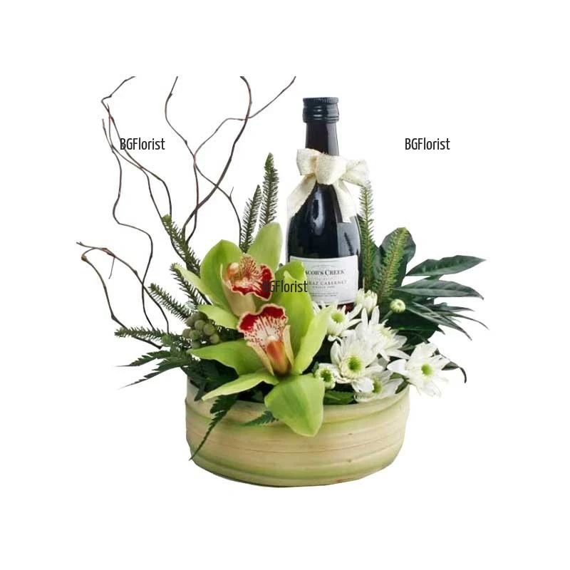 Send arrangement with orchids and wine by courier.