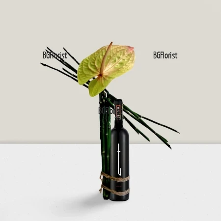 Send arrangement with flower and a bottle of wine by courier