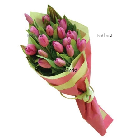Order bouquet of pink tulips and grenery