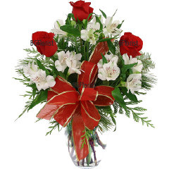 Красив и нежен празничен букет от червени рози и бели алстромерии, обгърнати от свежа зеленина