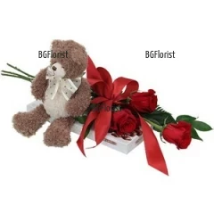 Romantic gift set for the beloved one. A Teddy bear, red roses and Merci chocolates - say "I love you" without using words.