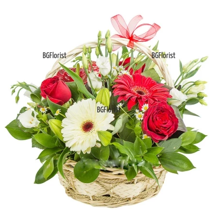 A basket with mixed flowers - Sigh