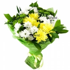 A classical bouquet of chrysanthemums in three different colours, delicately arranged with suitable fresh greeneries and wrap.
