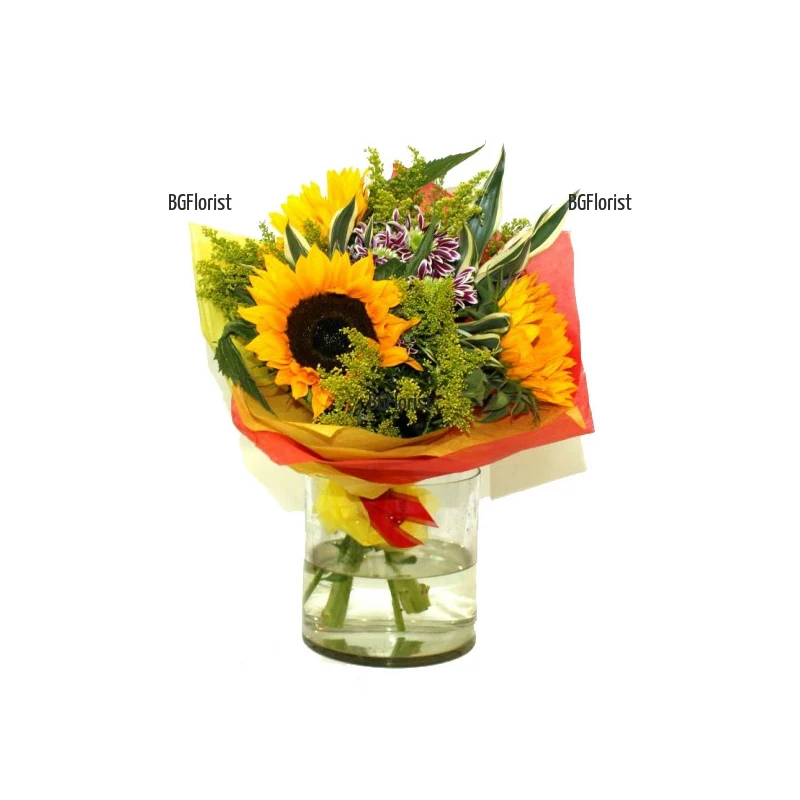 Summer bouquet of sunflowers and greens