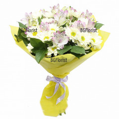 A gentle gift in the form of a beautiful bouquet of flowers, prepared to start a wonderful day for a wonderful person.