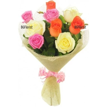 Delivery of a bouquet of colorful roses and greenery