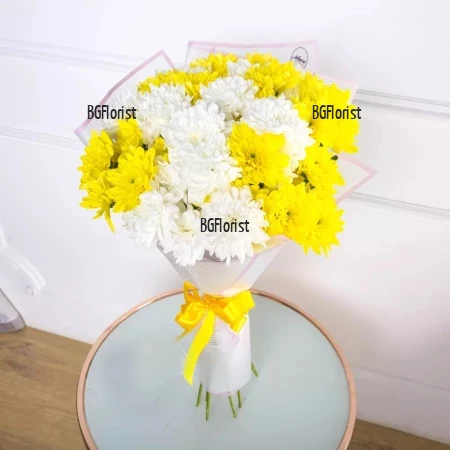 Delivery of a bouquet of yellow and white chrysanthemums