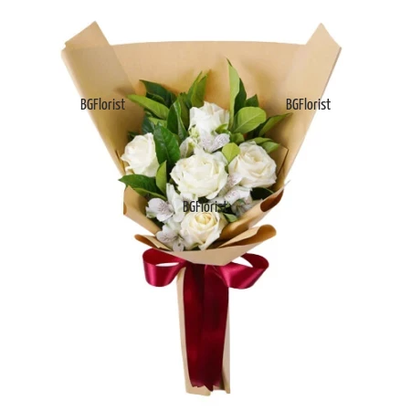 Delivery of a bouquet of white roses and flowers