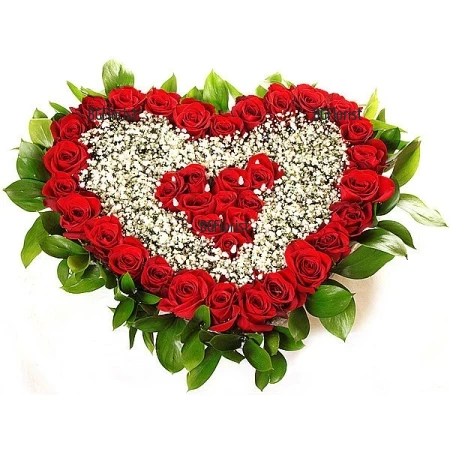 Send heart of roses and gypsophila by courier