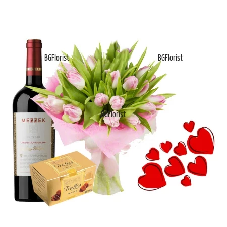 A bouquet of pink tulips and gifts