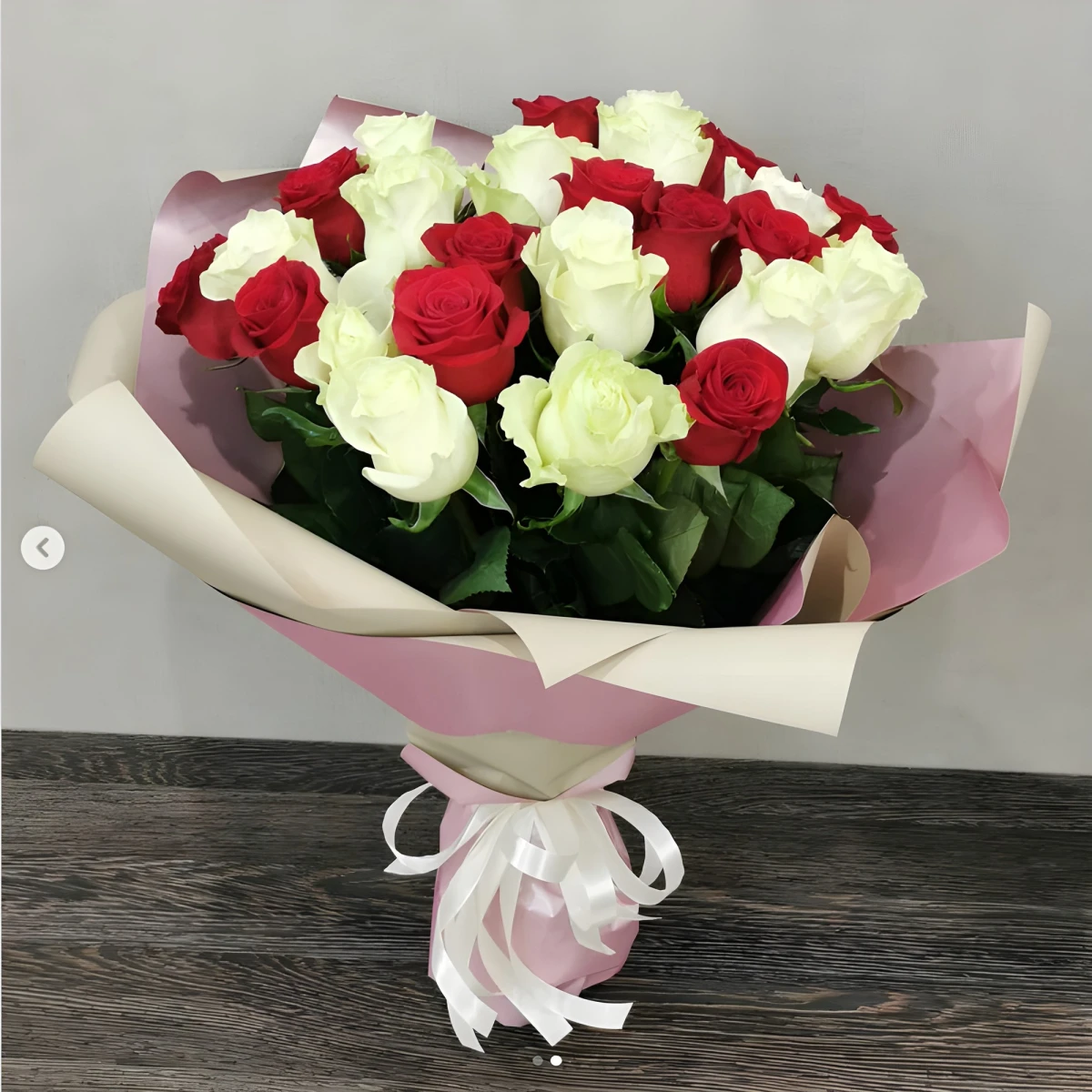 Send flowers - a bouquet of 35 white and red roses.