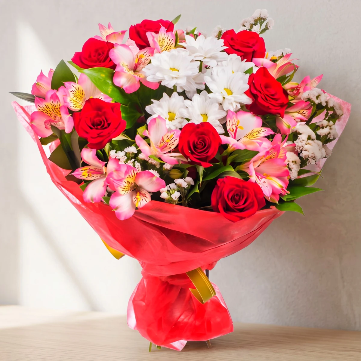 Delivery of a colorful bouquet of flowers and greenery