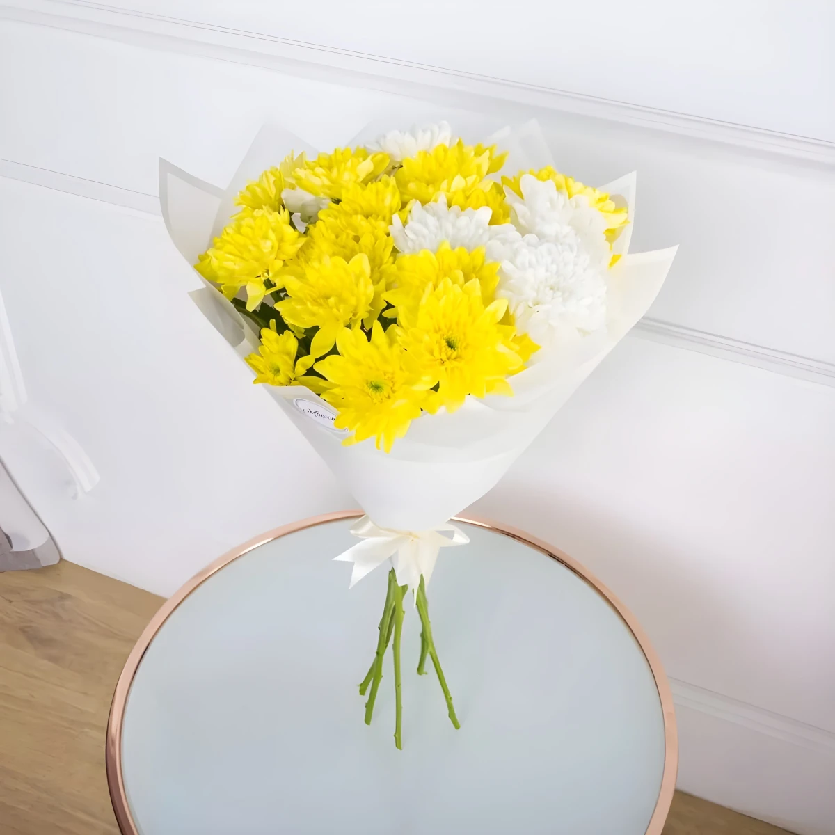 Delivery of a bouquet of yellow and white chrysanthemums