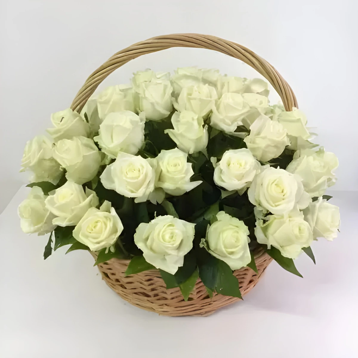 Send 35 white roses in a basket to Bulgaria