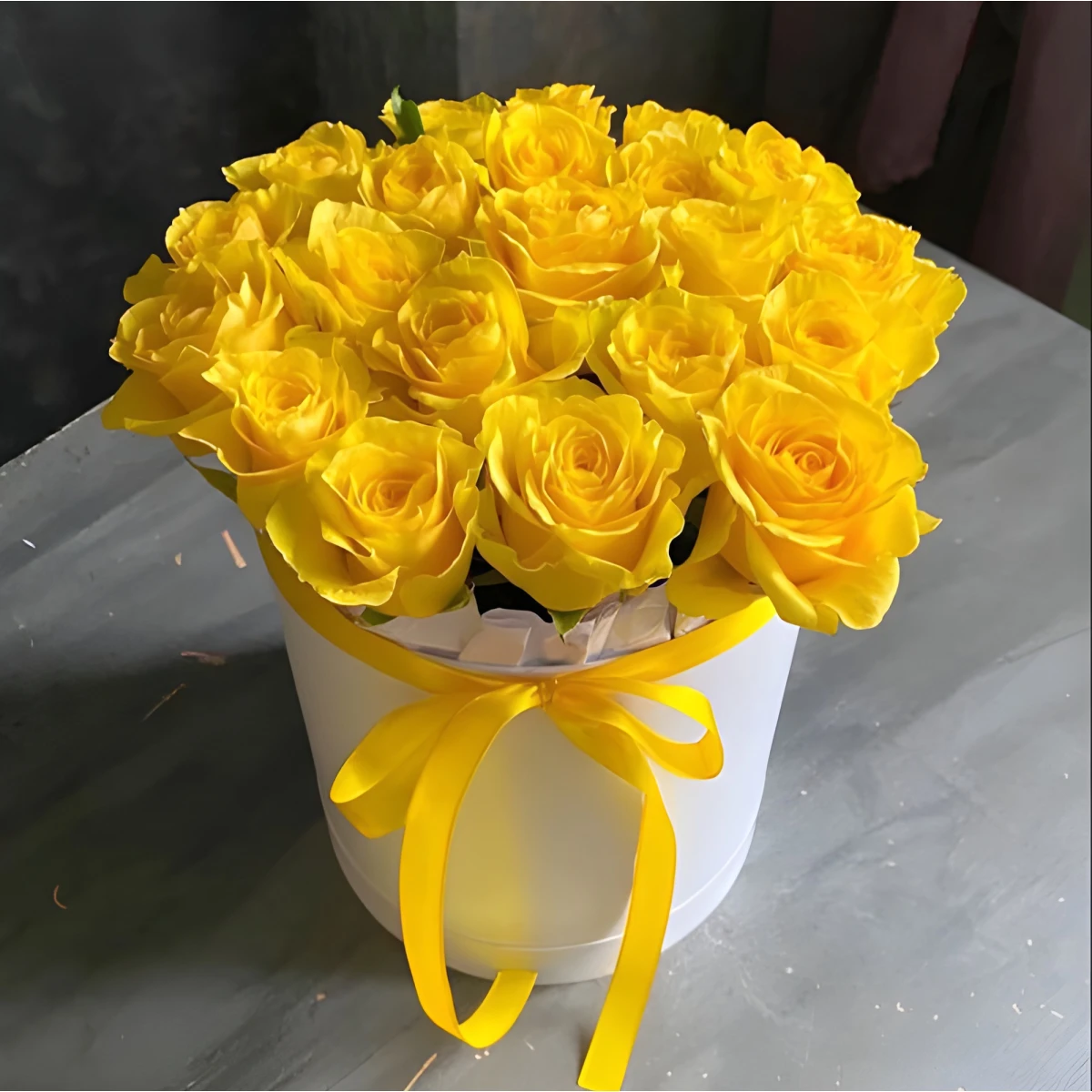25 yellow roses in a round box delivered to Bulgaria