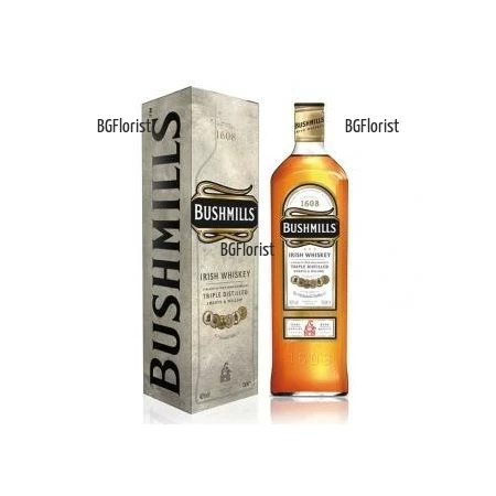 Send a bottle of classic Bushmills Whiskey 0.700 l
